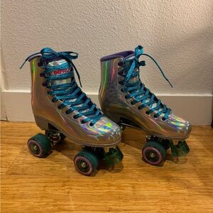 Impala silver iridescent roller skates with shimmery blue laces